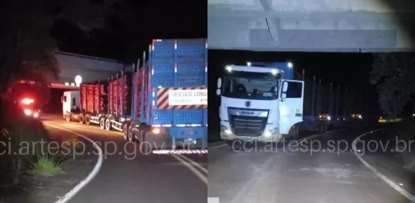 Carreta com carga de madeira fica entalada em viaduto em Águas de Santa Bárbara